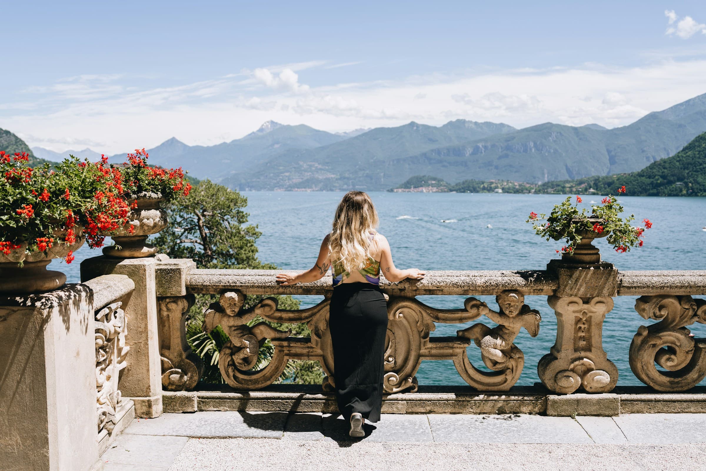 View from a balcony over Lake Como at sunset